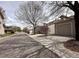 Street view of well maintained street with garages and a small tree in front of each garage at 438 N Parkside Dr # C, Longmont, CO 80501
