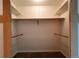 Spacious, carpeted walk-in closet with built-in shelving for optimal organization at 438 N Parkside Dr # C, Longmont, CO 80501