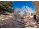 Outdoor patio features a grill, wrought iron furniture, and brick pavers at 2365 S Holly Pl, Denver, CO 80222