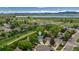 Aerial view of a neighborhood with a lake at 9150 W 94Th Ave, Westminster, CO 80021