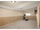 Finished basement with neutral color palette, carpeted flooring, and ample space for recreational activities or home gym at 9150 W 94Th Ave, Westminster, CO 80021