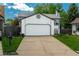 Attractive home featuring a two-car garage and well-kept landscaping at 9150 W 94Th Ave, Westminster, CO 80021