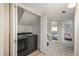 Convenient laundry room with modern washer and dryer, offering practicality and ease for household chores at 9150 W 94Th Ave, Westminster, CO 80021