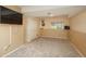 Finished basement with carpet, TV, and double door closet at 9150 W 94Th Ave, Westminster, CO 80021
