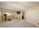 Finished basement with carpet, TV, and space for a home gym at 9150 W 94Th Ave, Westminster, CO 80021