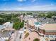 An aerial view of the town showcasing the layout, main buildings, and overall community atmosphere on a sunny day at 6674 Fonder Villa Dr, Parker, CO 80134