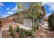A low-maintenance backyard featuring a private hot tub and lush landscaping at 6674 Fonder Villa Dr, Parker, CO 80134