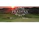 Pradera Golf Club's meticulously groomed greens with a scenic sunset backdrop at 6674 Fonder Villa Dr, Parker, CO 80134