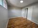 Light-filled bedroom with ample closet space and hardwood floors at 2865 Carnation Way, Thornton, CO 80229