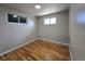 Cozy bedroom with hardwood floors and a window view at 2865 Carnation Way, Thornton, CO 80229