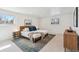Bedroom features modern décor, plush bedding, and stylish furnishings for ultimate comfort at 5467 W Hinsdale Pl, Littleton, CO 80128