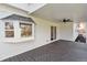 View of the back deck with sliding glass doors and a bay window, inviting outdoor enjoyment at 5467 W Hinsdale Pl, Littleton, CO 80128