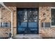 Front entrance of the home featuring a security door at 1759 Quail St, Lakewood, CO 80215