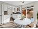 Modern white kitchen with stainless steel appliances and island at 1759 Quail St, Lakewood, CO 80215