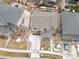 An aerial perspective of a house surrounded by well-kept landscaping and neighboring homes at 8035 S Kewaunee St, Aurora, CO 80016