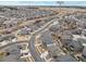 Aerial view of the neighborhood including the street, nearby trails, and park at 8035 S Kewaunee St, Aurora, CO 80016