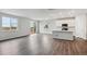 Modern kitchen with island, stainless steel appliances, and white cabinets at 5710 Ranch St, Mead, CO 80504