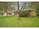 Charming single Gathering home with mature tree, brick exterior and well-manicured front yard at 8269 Zephyr St, Arvada, CO 80005