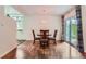 Cozy dining area with a round table and sliding doors, perfect for intimate meals and gatherings at 6748 S Gallup St, Littleton, CO 80120