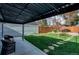 Backyard featuring seating area, a yard and a fence at 3052 S Cherokee St, Englewood, CO 80110