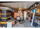 Cluttered interior of garage used for storage of boxes and household items at 3052 S Cherokee St, Englewood, CO 80110