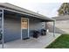 Outdoor patio space with comfortable seating and shade, perfect for relaxation at 3052 S Cherokee St, Englewood, CO 80110