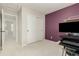 Bedroom showcasing a closet and purple wall, perfect for a functional and stylish space at 11725 Helena St, Commerce City, CO 80022