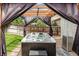 Hot tub with privacy curtains in the backyard at 11725 Helena St, Commerce City, CO 80022