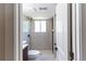A bathroom with modern fixtures, a stand-up shower, and decorative tiling at 9410 Perry St, Westminster, CO 80031