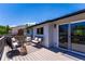 Spacious deck featuring chairs and an outdoor seating area, with views to the side of the home at 9410 Perry St, Westminster, CO 80031
