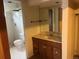 Bathroom featuring tile and updated fixtures at 7127 Otis St, Arvada, CO 80003