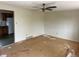 Open floor plan showing living room with view into the kitchen area at 7127 Otis St, Arvada, CO 80003