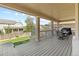 Covered deck offering a dining area and backyard views at 2669 Red Bird Trl, Castle Rock, CO 80108