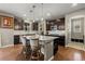 Modern kitchen with granite countertops, stainless steel appliances, and a center island providing ample space for cooking at 2669 Red Bird Trl, Castle Rock, CO 80108