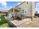 Backyard patio with outdoor seating, ideal for relaxation and entertaining at 2669 Red Bird Trl, Castle Rock, CO 80108