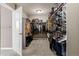 Spacious walk-in closet with ample storage and well-organized shelving for clothes and accessories at 2669 Red Bird Trl, Castle Rock, CO 80108