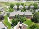 Overhead view shows beautiful green common areas, mature trees, walkways, and multiple buildings in the community at 9110 Gale Blvd # 3, Thornton, CO 80260