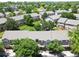 Overhead view of this community with multiple buildings, green space, mature trees, and a nice layout at 9110 Gale Blvd # 3, Thornton, CO 80260