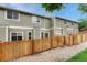 Exterior view of the home's backyard, highlighting a private fenced area for outdoor enjoyment and relaxation at 9110 Gale Blvd # 3, Thornton, CO 80260
