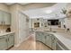 Modern kitchen featuring light-colored cabinets, stainless steel appliances, and sleek countertops at 9110 Gale Blvd # 3, Thornton, CO 80260