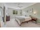 Serene bedroom retreat with plush carpeting, contemporary decor, and natural light at 9110 Gale Blvd # 3, Thornton, CO 80260