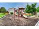 Community playground area with slides, climbing structures, and shade, perfect for outdoor fun at 9110 Gale Blvd # 3, Thornton, CO 80260