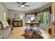 Comfortable office featuring wood flooring and views of the landscaped yard at 1007 Nob Hill Rd, Evergreen, CO 80439