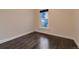 Cozy bedroom with hardwood floors and a window with natural light at 340 S Logan St, Denver, CO 80209