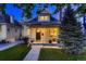 Charming home featuring a covered front porch, manicured lawn, and classic architectural details, perfect for curb appeal at 340 S Logan St, Denver, CO 80209