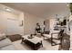 Open living space with hardwood floors, neutral tones, and comfortable seating, blending style and functionality seamlessly at 340 S Logan St, Denver, CO 80209