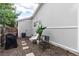 Backyard featuring a seating area, privacy fence, and well-maintained exterior of the home at 4800 S Tabor St, Morrison, CO 80465