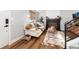 Inviting living room with fireplace, staircase, and modern furnishings at 4800 S Tabor St, Morrison, CO 80465