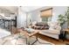 Cozy living room featuring a sofa, area rug, and comfortable decor at 4800 S Tabor St, Morrison, CO 80465