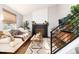 Cozy living room features a fireplace, plush sofa, and stylish decor at 4800 S Tabor St, Morrison, CO 80465